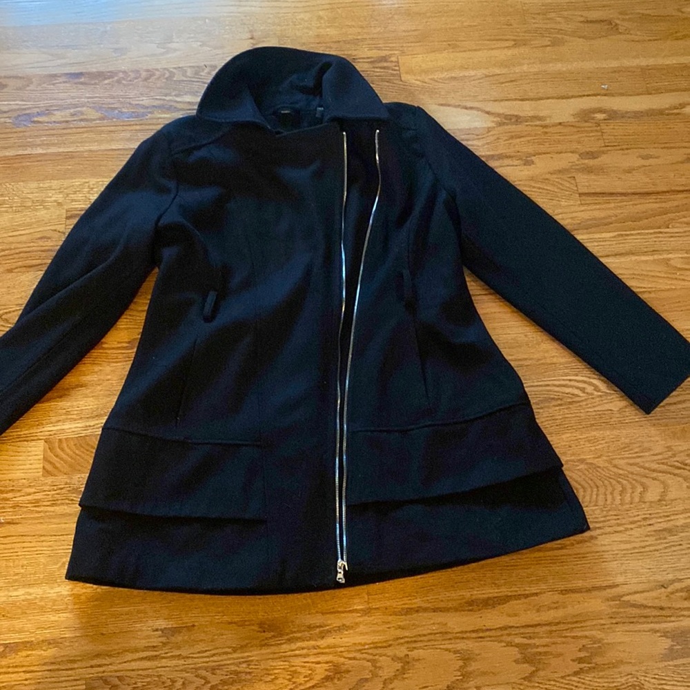 Guess winter jacket. Black with gold zipper. Labeled as XXL. May fit XL better.